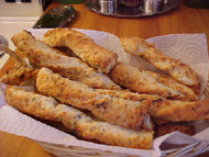 Pains bâtonnets au parmesan et herbes