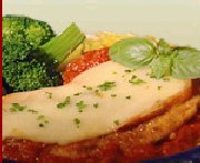 Escalopes de dinde panes et fromage gratin