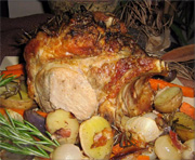 Rôti de porc bout de côte, ail et au romarin