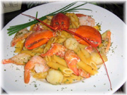 Trio de la mer en bisque de homard, sur penne